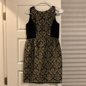 Black and gold sleeveless dress